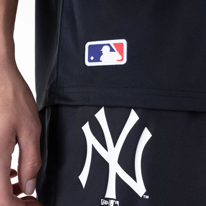 The Male model is wearing New York Yankees League Essential Black T-Shirt 6