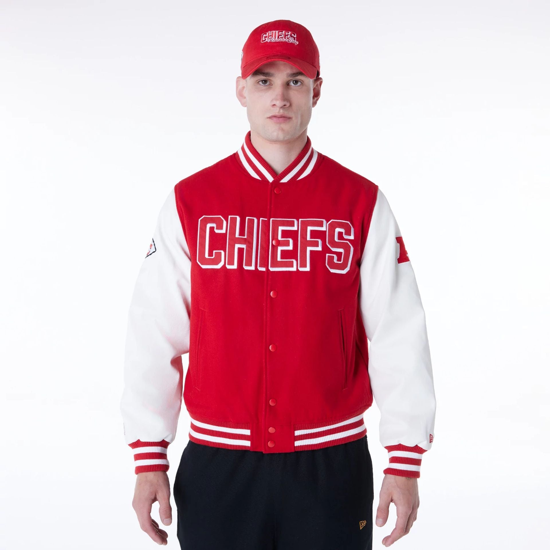 The Male model is wearing Kansas City Chiefs NFL Red Varsity Jacket 1