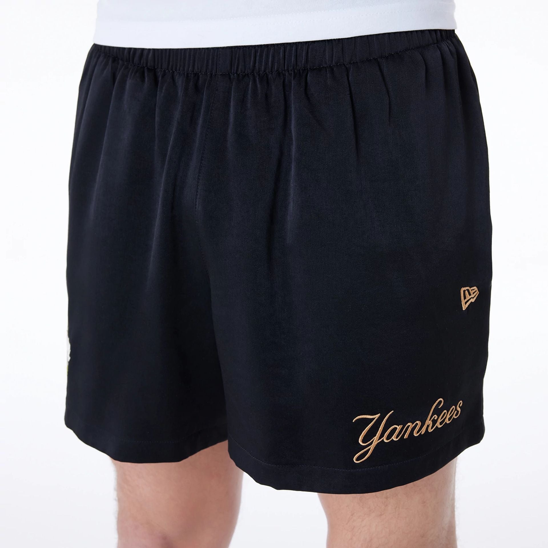 The Male model is wearing New York Yankees MLB Woven Black Shorts 5