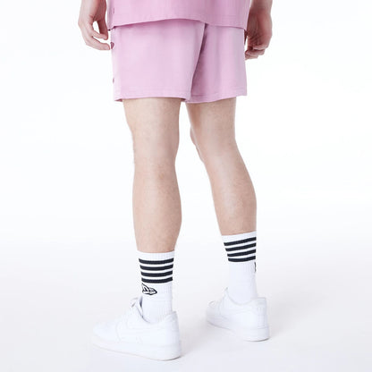 The Male model is wearing New York Yankees MLB Woven Dark Pink Shorts 7