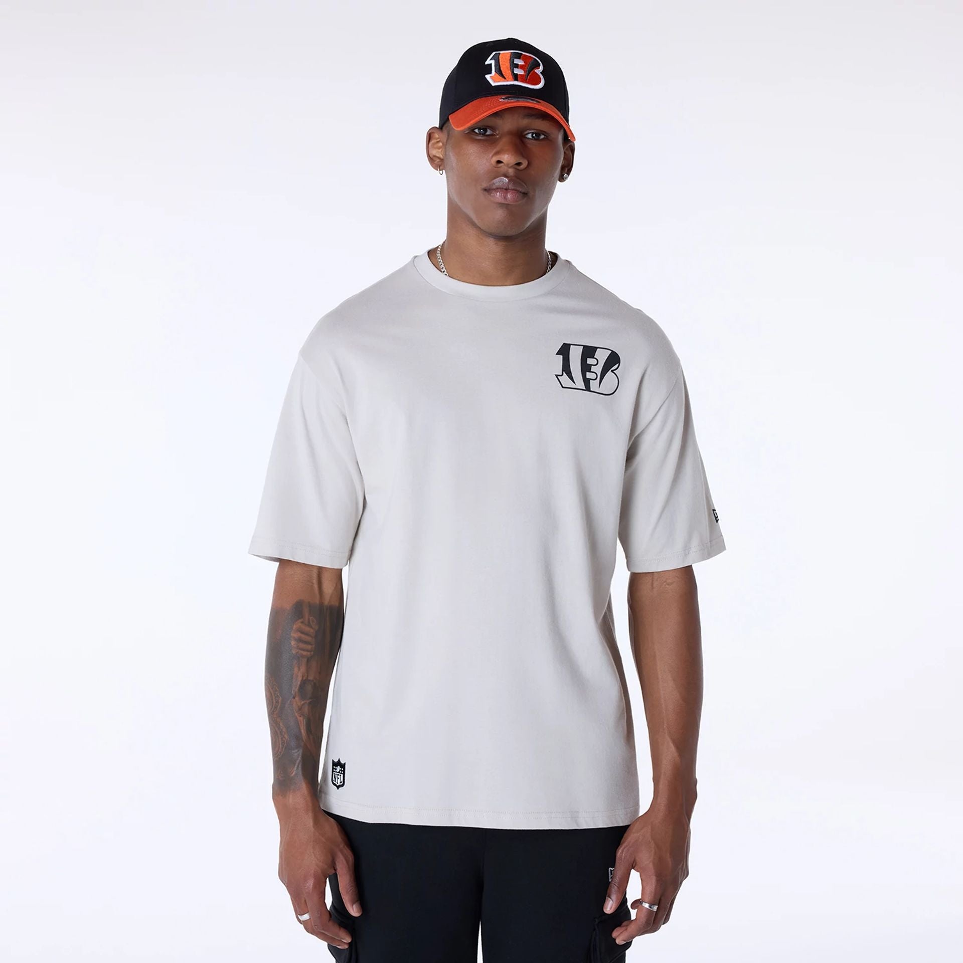 The Male model is wearing Cincinnati Bengals Super Bowl Graphic Cream Oversized T-Shirt 1