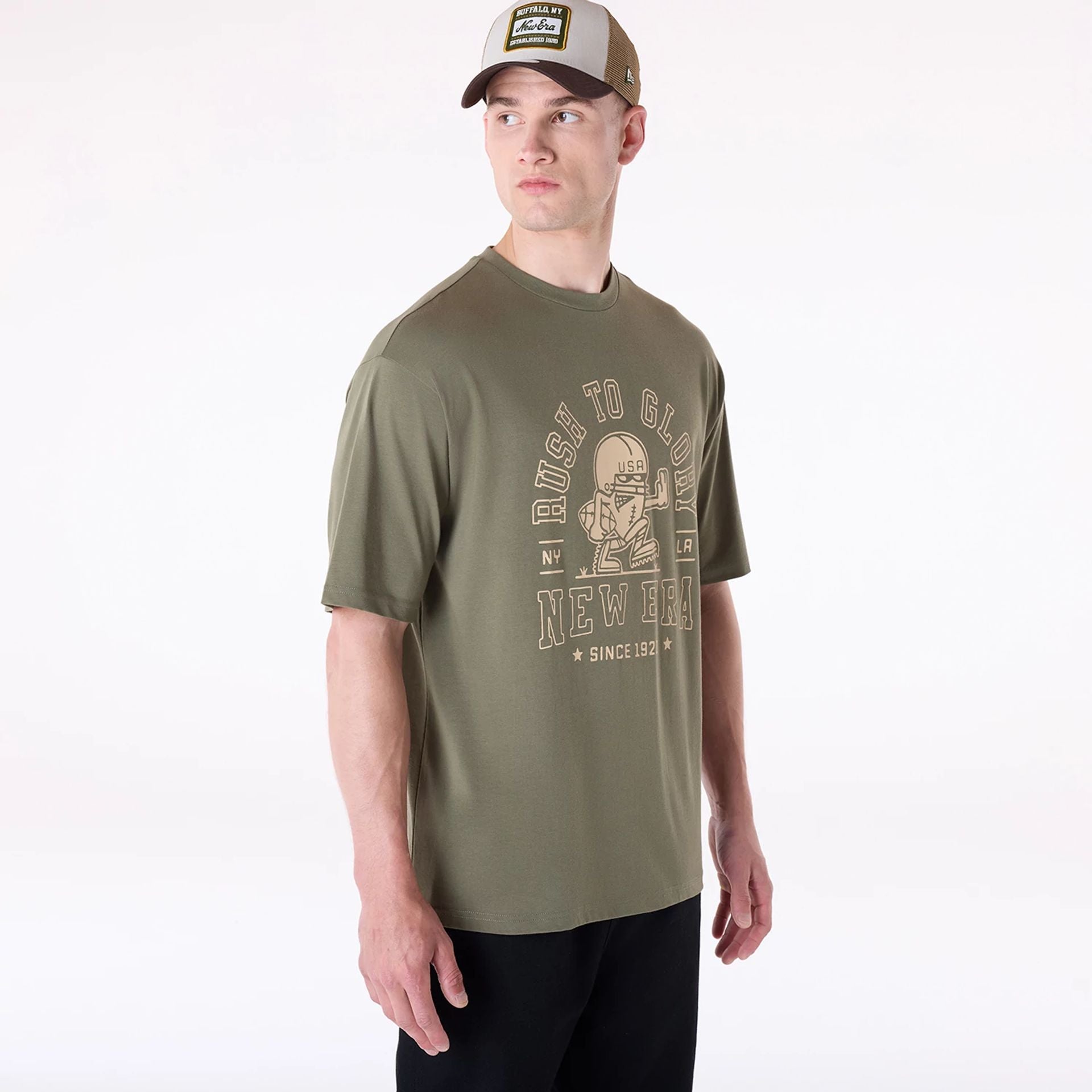 The Male model is wearing New Era Football Graphic Green T-Shirt 4