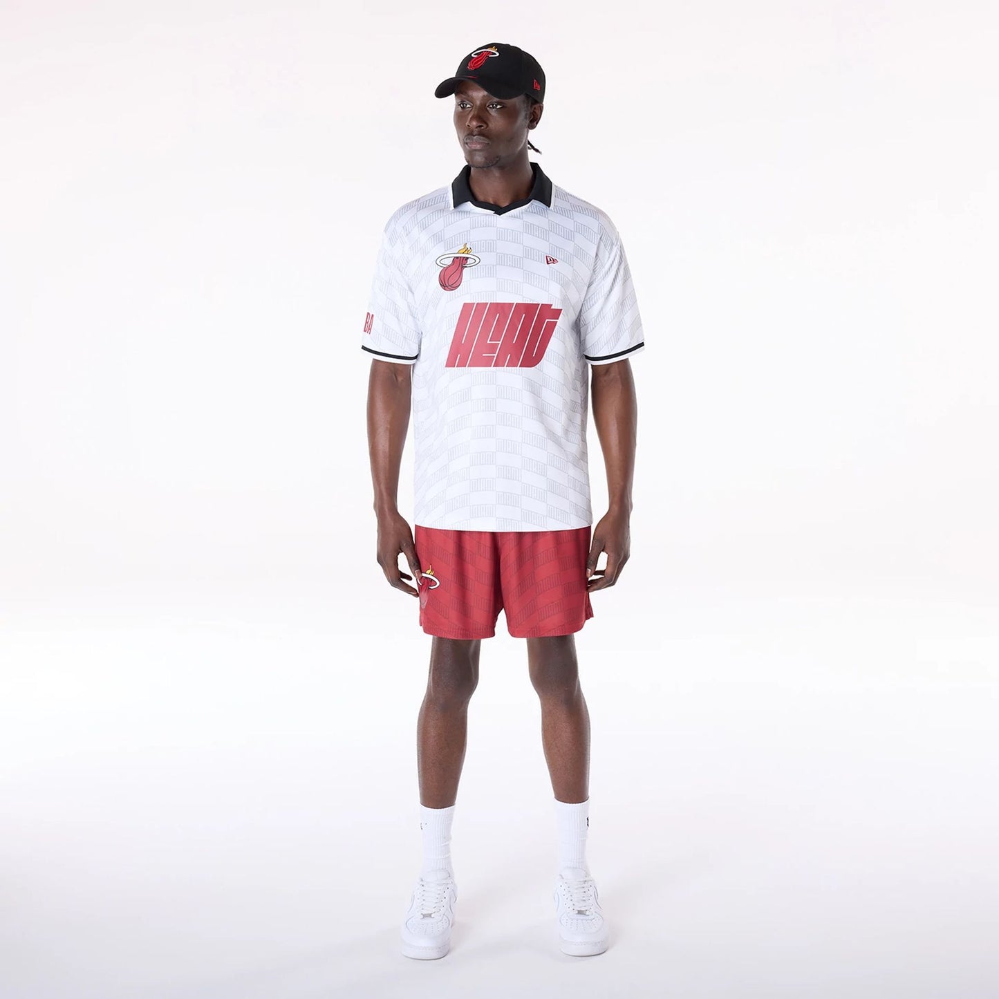 The Male model is wearing Miami Heat NBA Soccer White Oversized T-Shirt 4