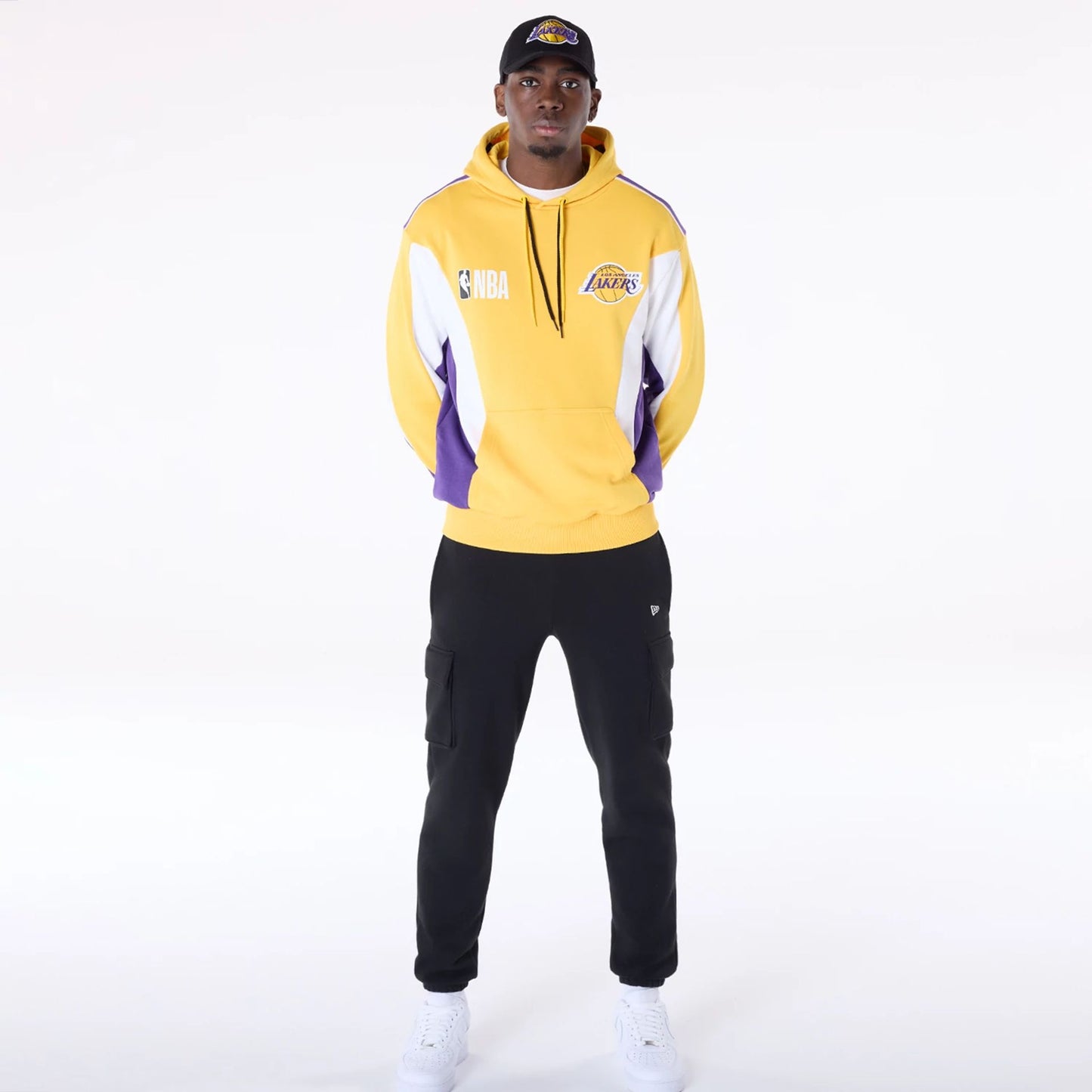 The Male model is wearing LA Lakers NBA Graphic Yellow Oversized Pullover Hoodie 3