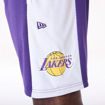 The Male model is wearing LA Lakers NBA Graphic Purple Mesh Shorts 4