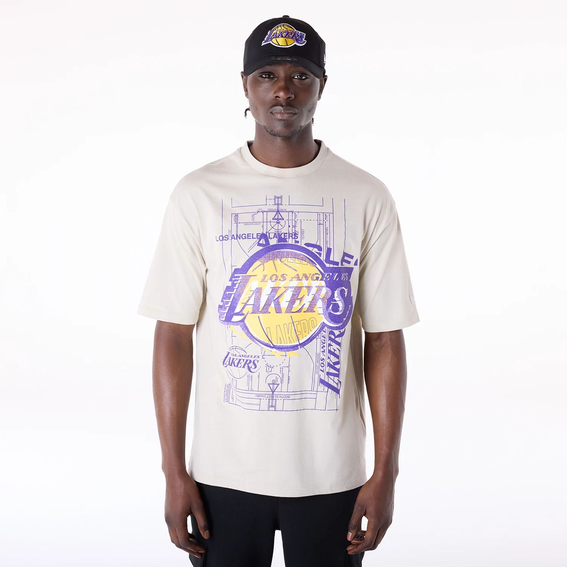 The Male model is wearing LA Lakers NBA Graphic Cream T-Shirt 1