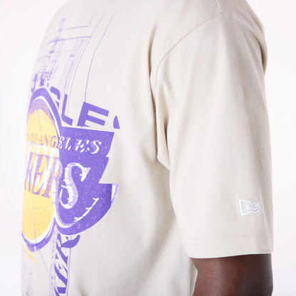 The Male model is wearing LA Lakers NBA Graphic Cream T-Shirt 5