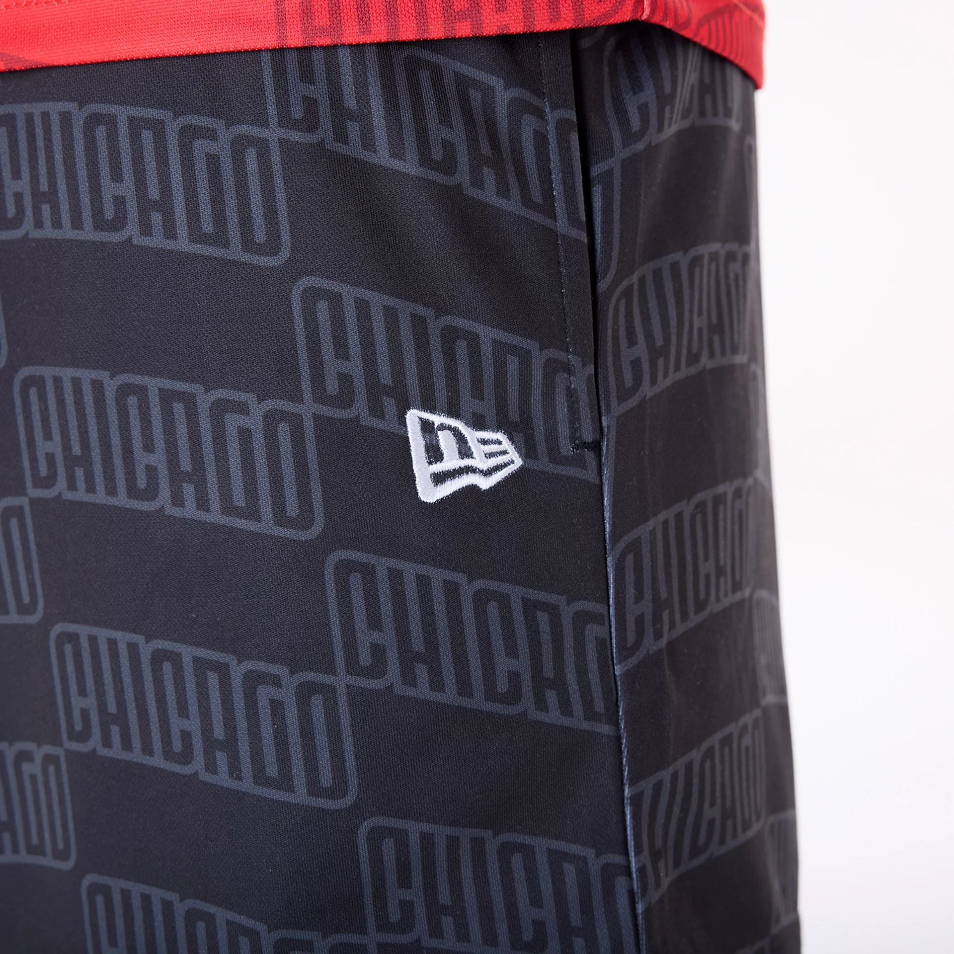 The Male model is wearing Chicago Bulls NBA All Over Print Graphic Black Shorts 6