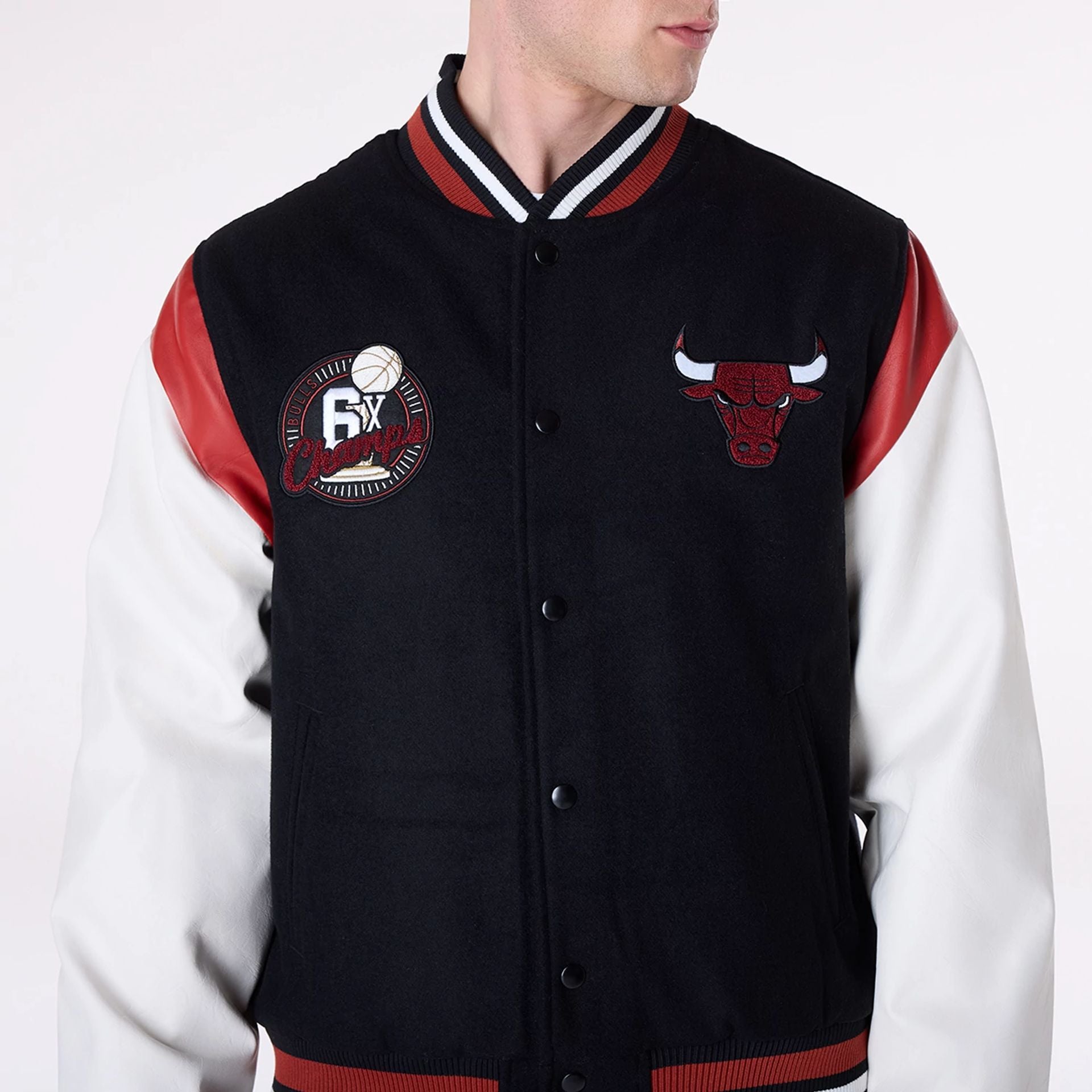 The Male model is wearing Chicago Bulls NBA Floral Black Varsity Jacket 7