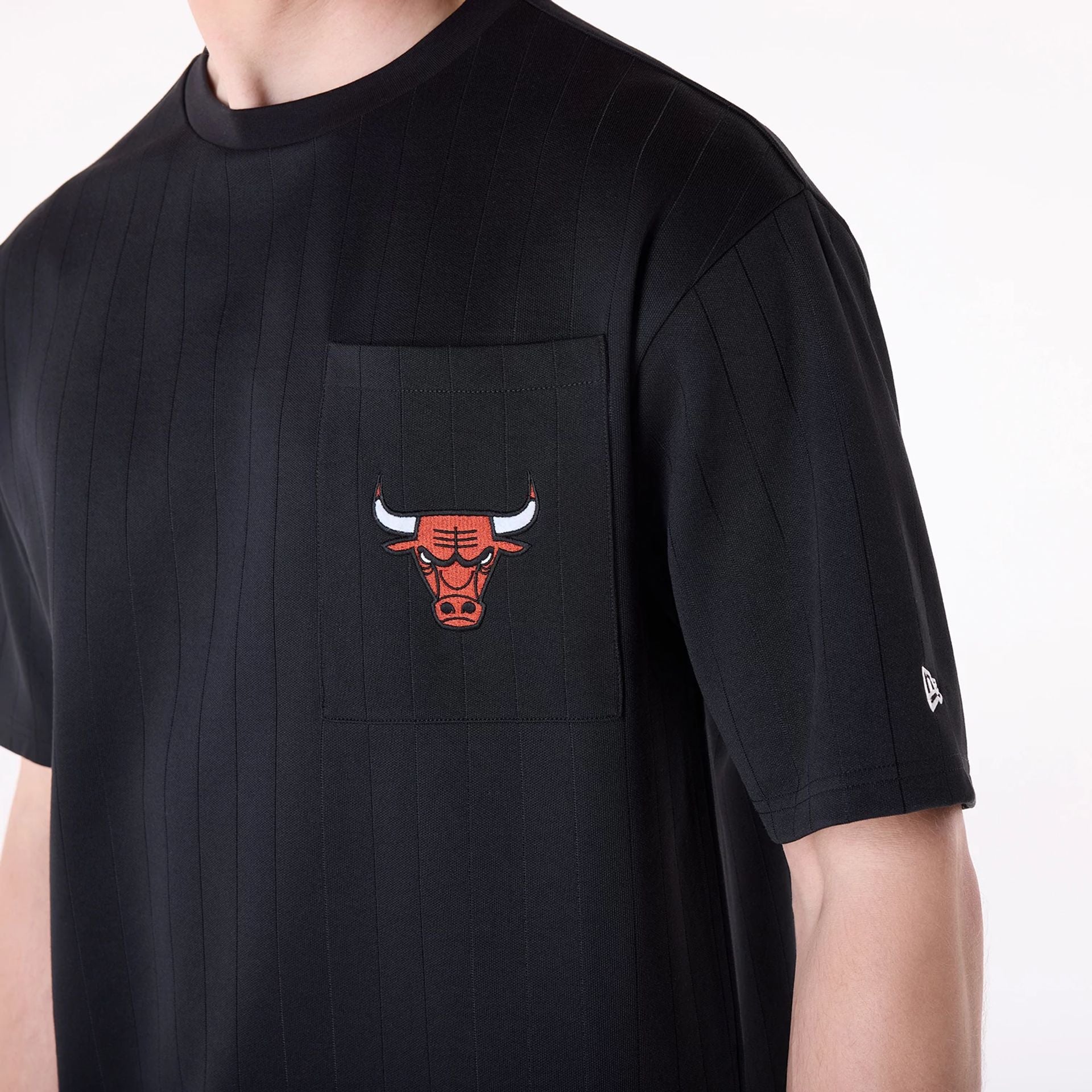 The Male model is wearing Chicago Bulls NBA Pinstripe Black Oversized T-Shirt 5