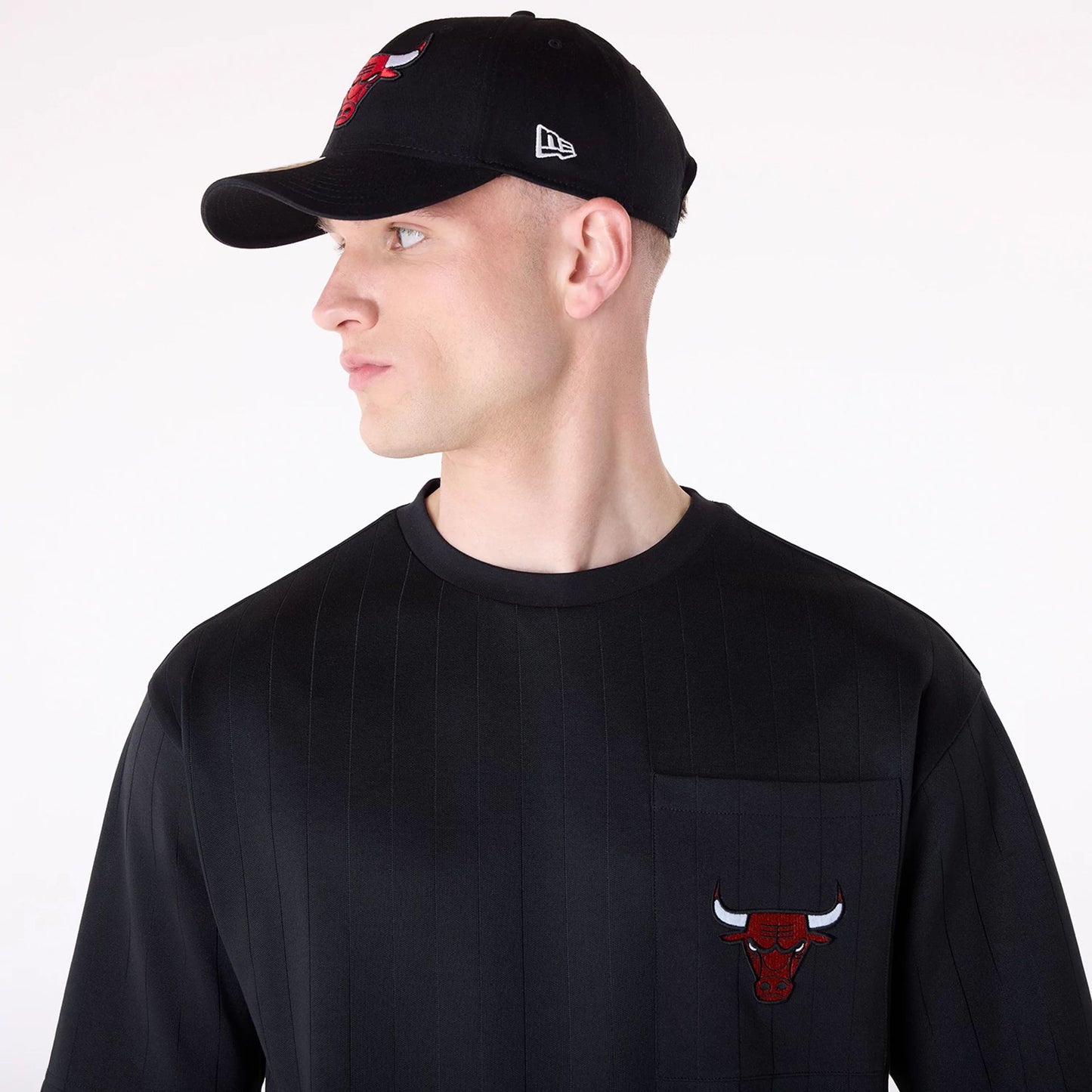 The Male model is wearing Chicago Bulls NBA Pinstripe Black Oversized T-Shirt 4