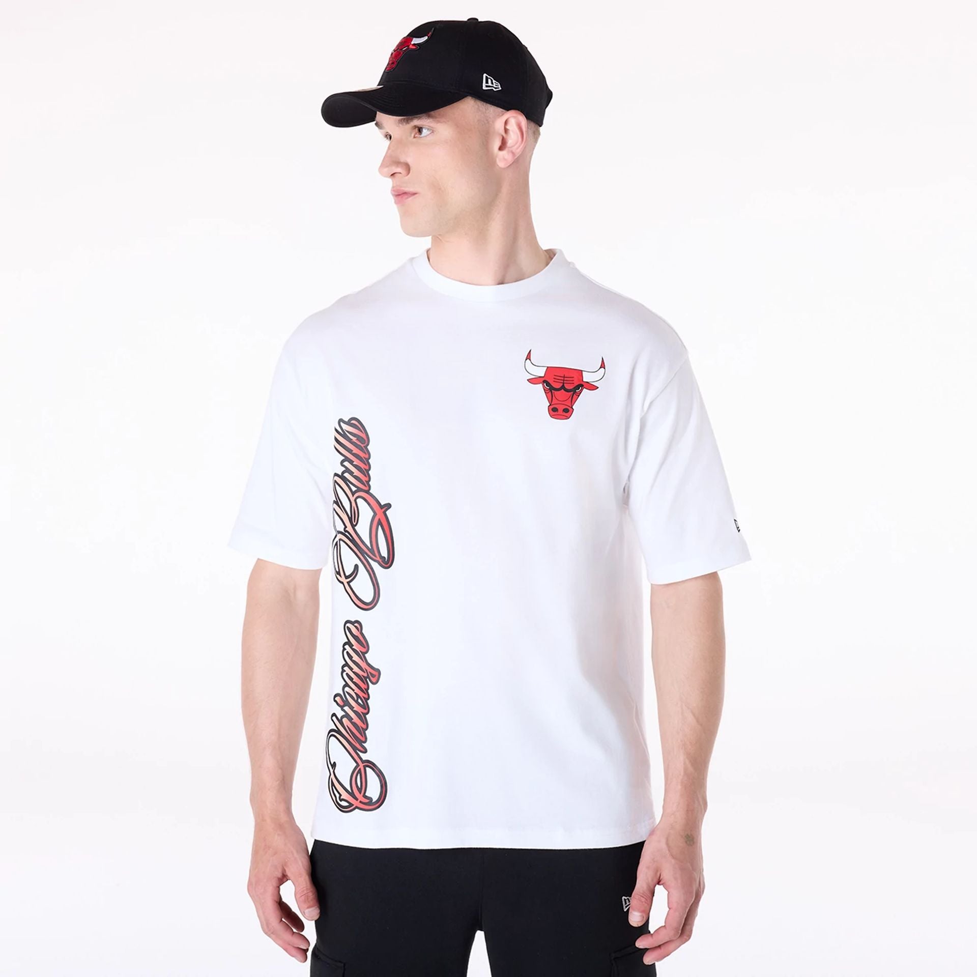 The Male model is wearing Chicago Bulls NBA Font Graphic White T-Shirt 1