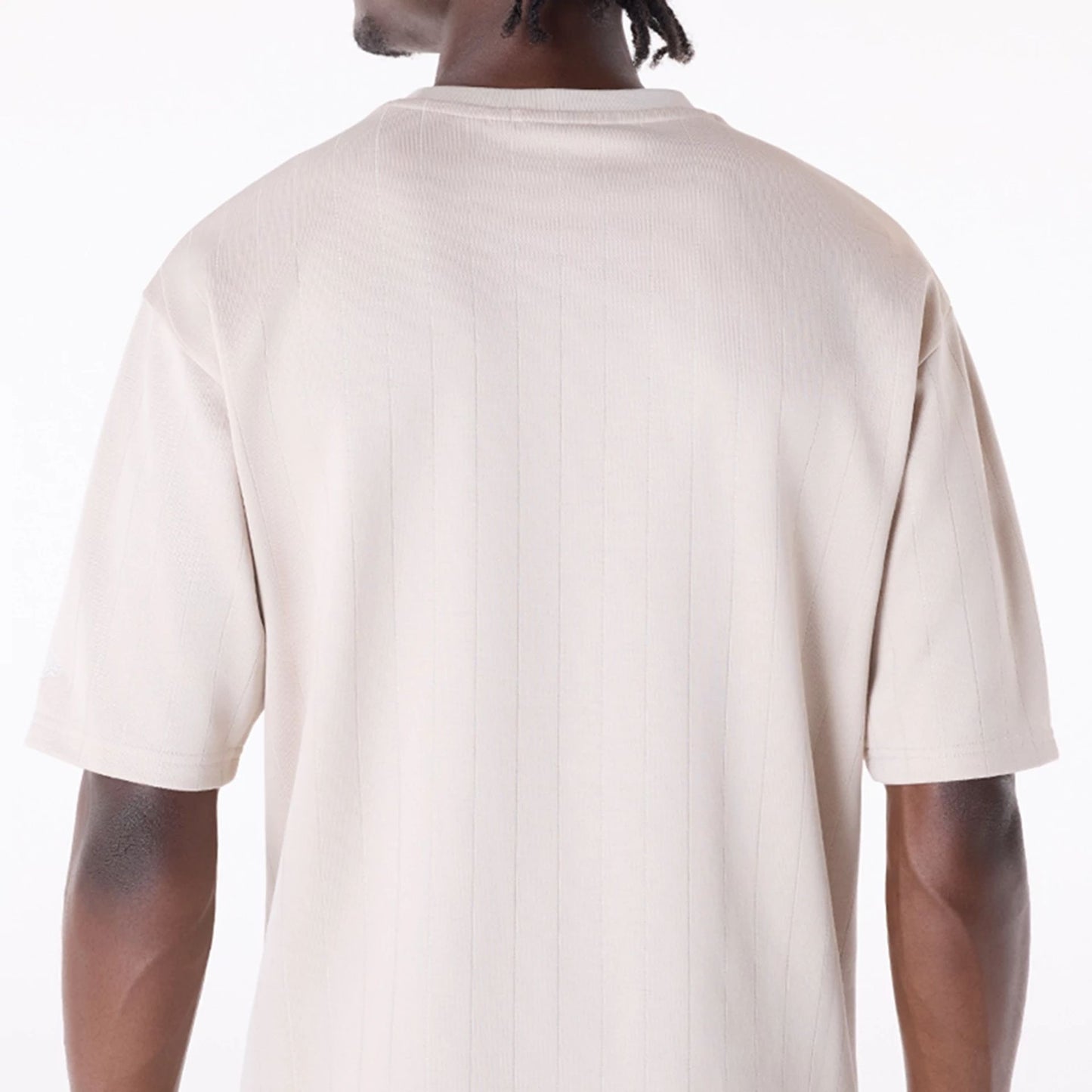 The Male model is wearing LA Lakers NBA Pinstripe Cream Oversized T-Shirt 3