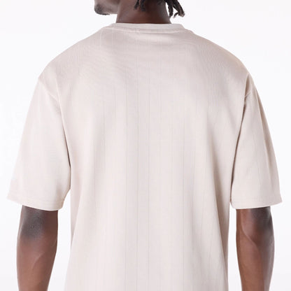 The Male model is wearing LA Lakers NBA Pinstripe Cream Oversized T-Shirt 3