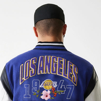 The Male model is wearing LA Lakers NBA Floral Dark Blue Varsity Jacket 3