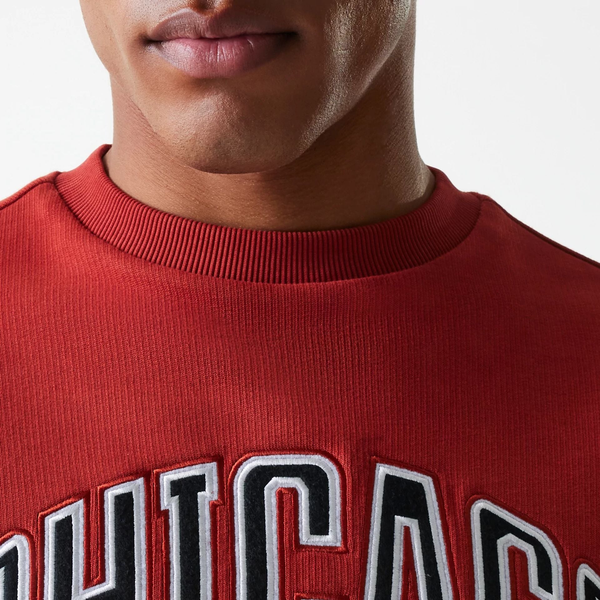 The Male model is wearing Chicago Bulls NBA Floral Red Oversized Crew Neck Sweater 5