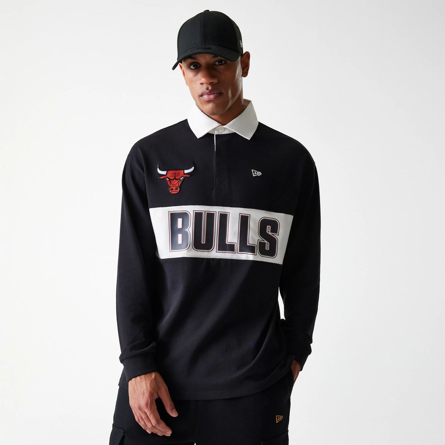 The Male model is wearing Chicago Bulls NBA Rugby Black Long Sleeve Polo 1