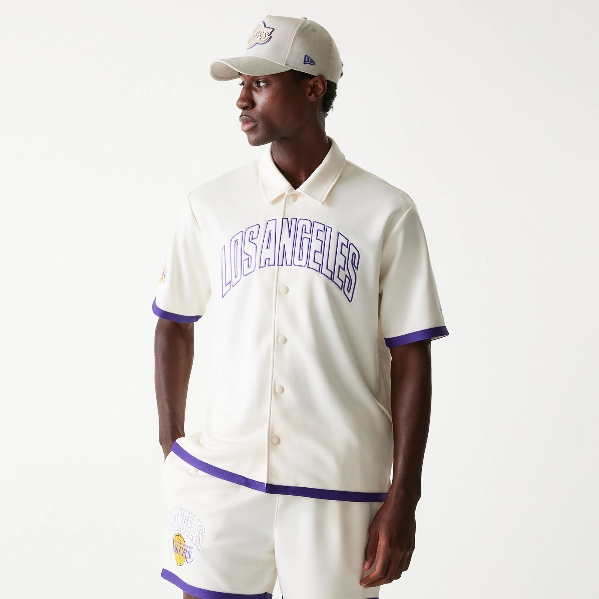 The Male model is wearing LA Lakers NBA Snap Button Open White Short Sleeve Shirt 1