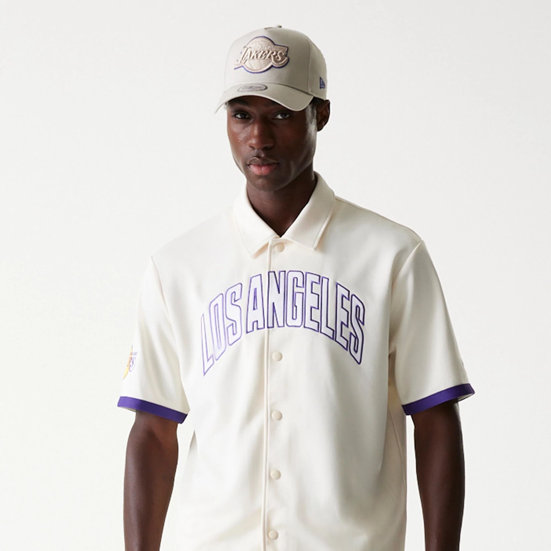 The Male model is wearing LA Lakers NBA Snap Button Open White Short Sleeve Shirt 5