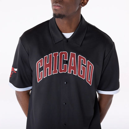 The Male model is wearing Chicago Bulls NBA Snap Button Black Short Sleeve Shirt 7