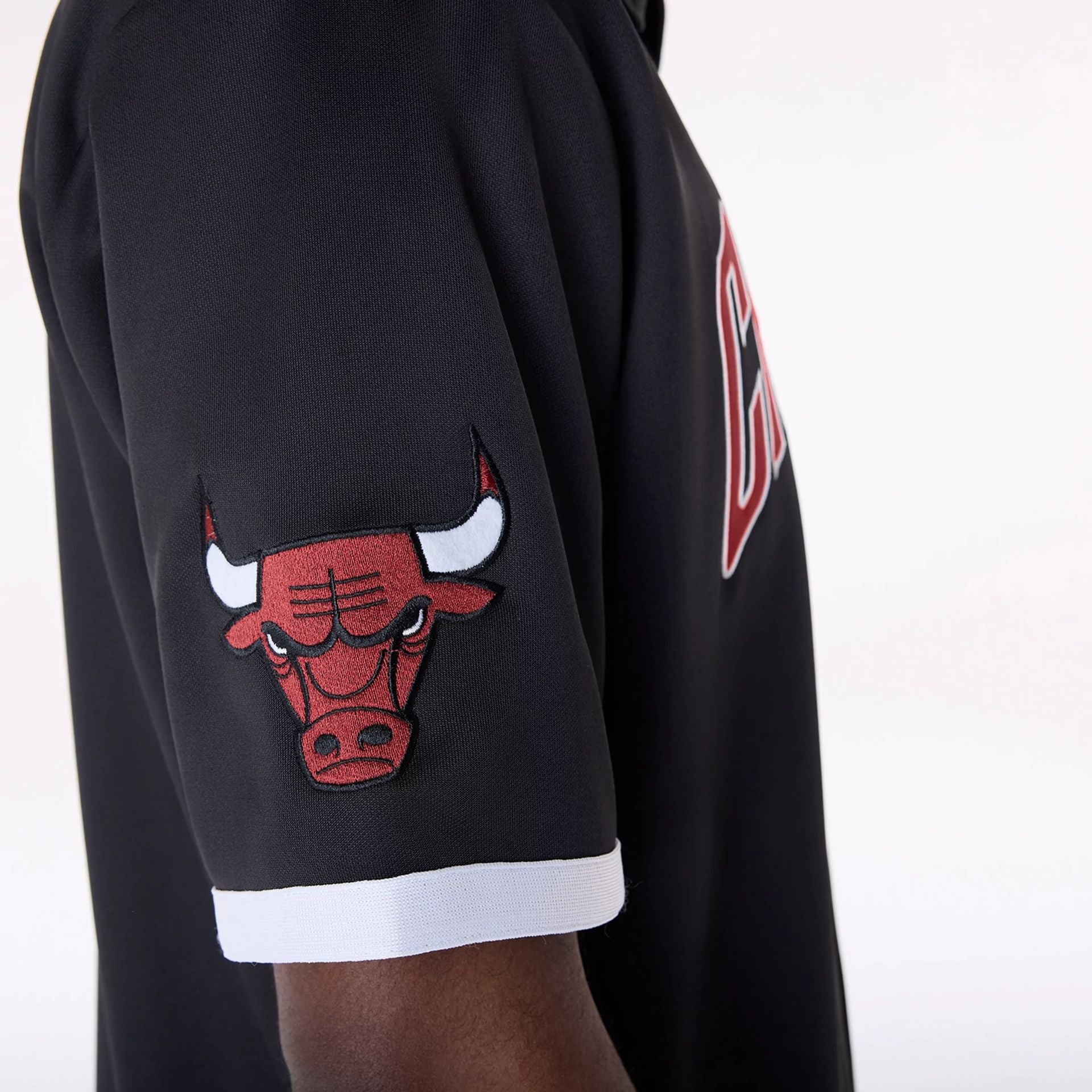 The Male model is wearing Chicago Bulls NBA Snap Button Black Short Sleeve Shirt 6