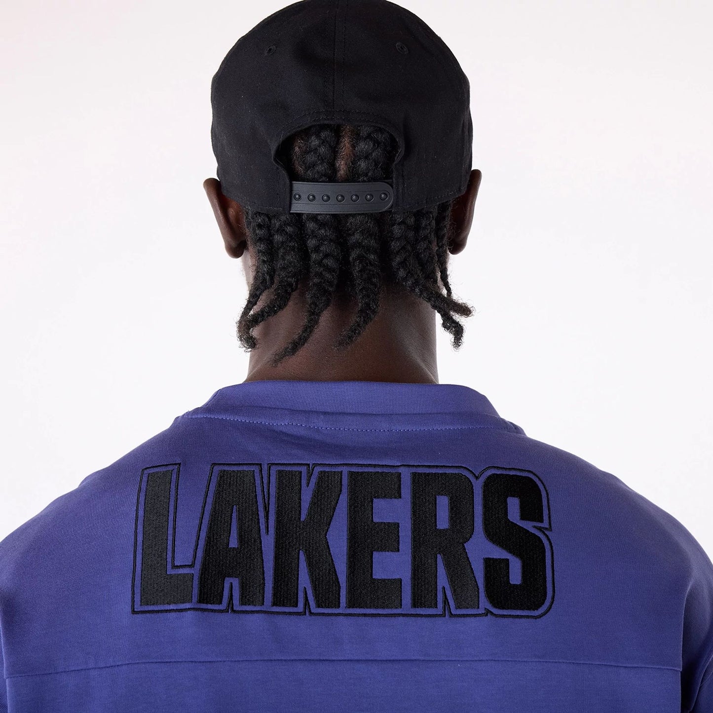 The Male model is wearing LA Lakers NBA Wordmark Dark Blue Oversized T-Shirt 6