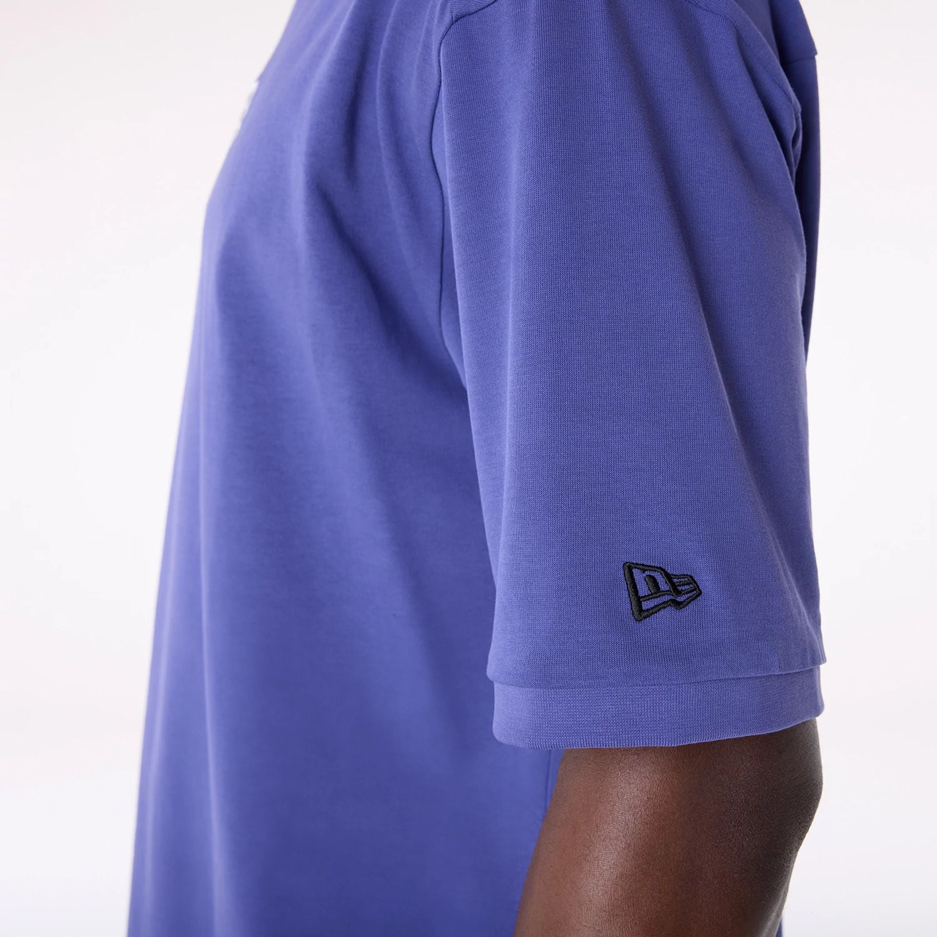 The Male model is wearing LA Lakers NBA Wordmark Dark Blue Oversized T-Shirt 5