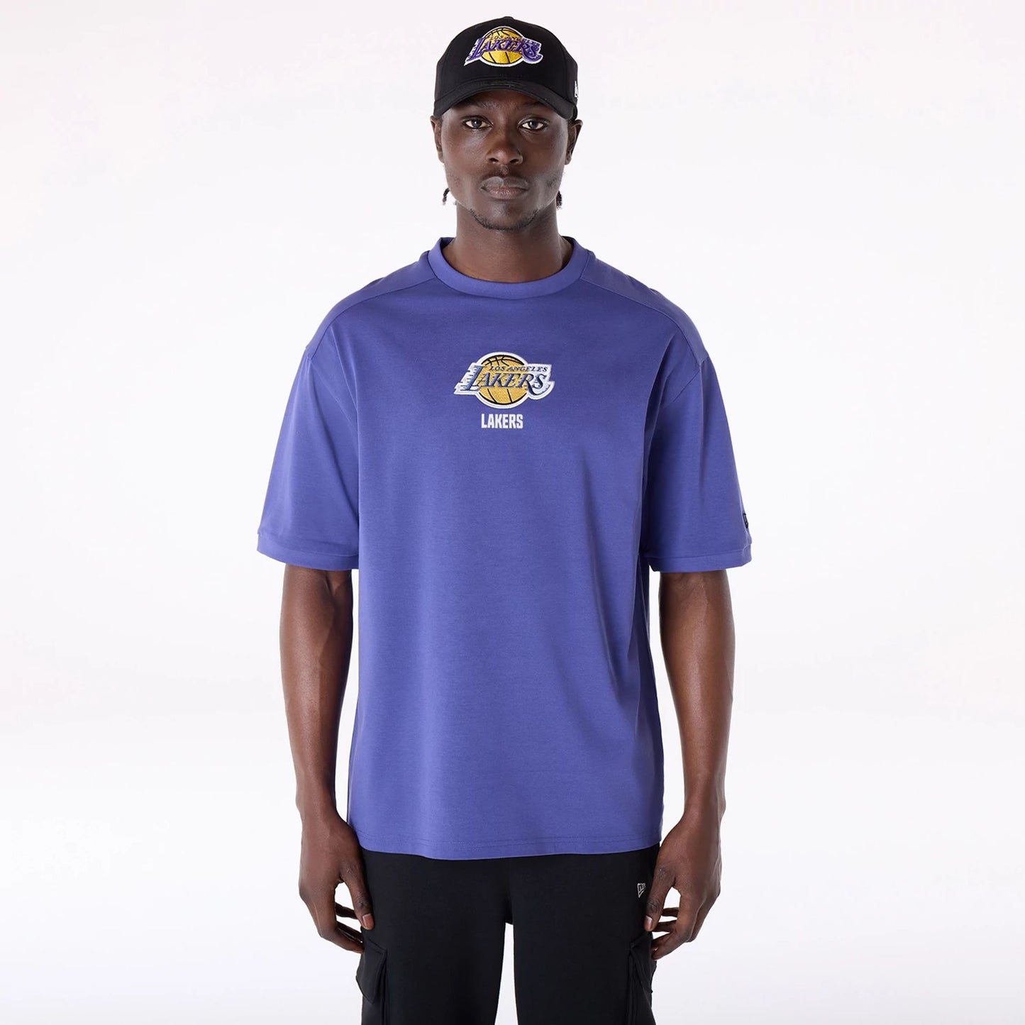 The Male model is wearing LA Lakers NBA Wordmark Dark Blue Oversized T-Shirt 1