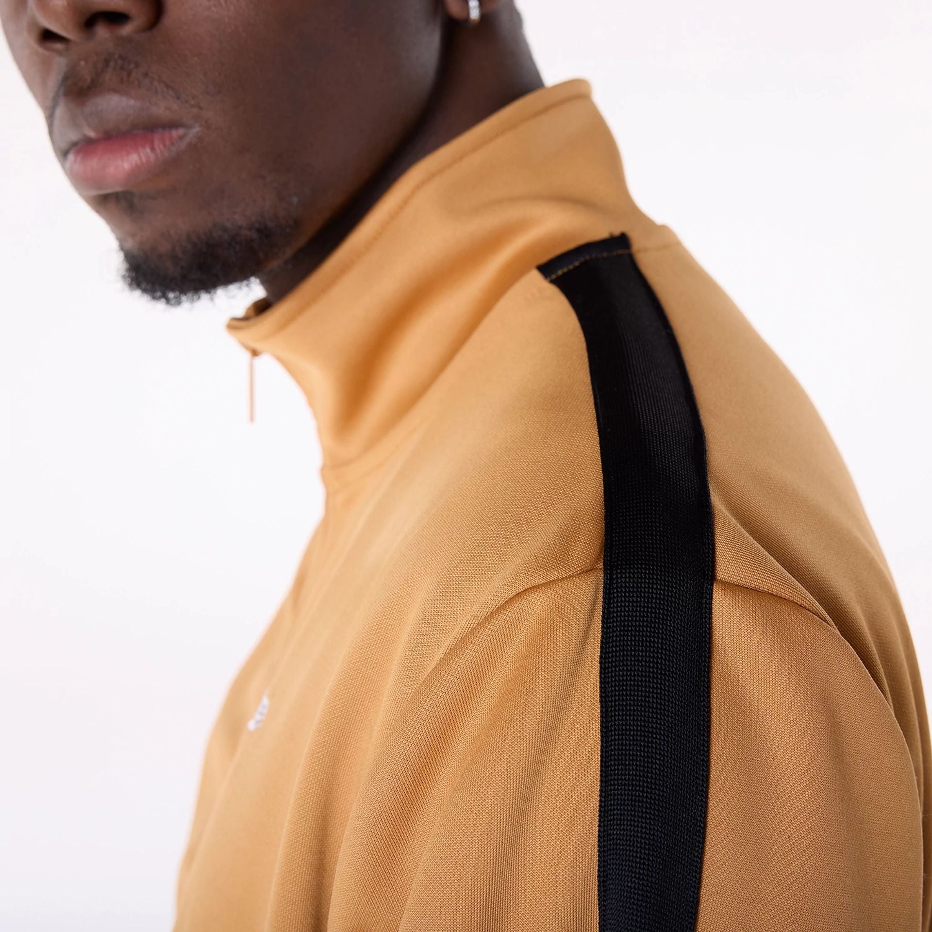 The Male model is wearing LA Lakers NBA Dark Beige Track Jacket 3