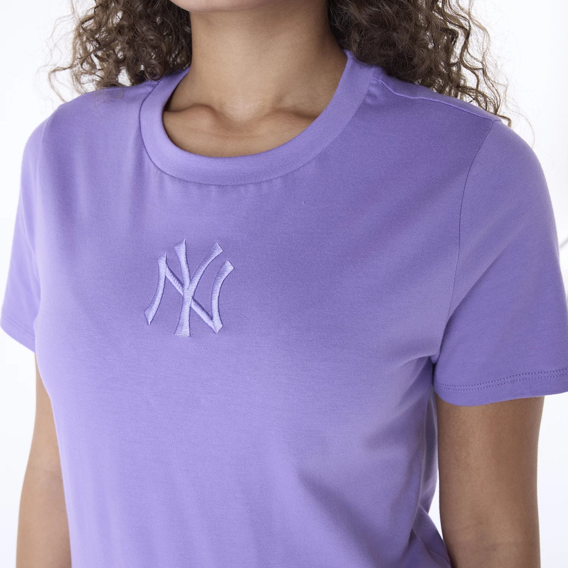 The Female model is wearing New York Yankees Womens MLB League Essential Purple T-Shirt 7