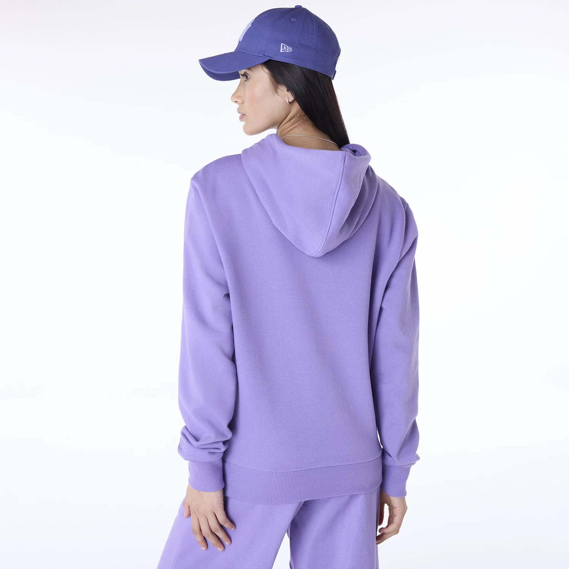 The Female model is wearing New York Yankees Womens MLB League Essential Purple Pullover Hoodie 2