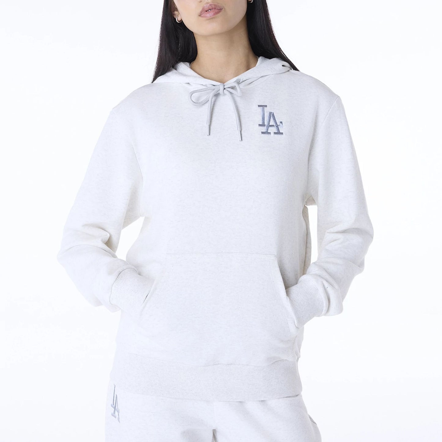 The Female model is wearing LA Dodgers Womens MLB League Essential White Pullover Hoodie 4