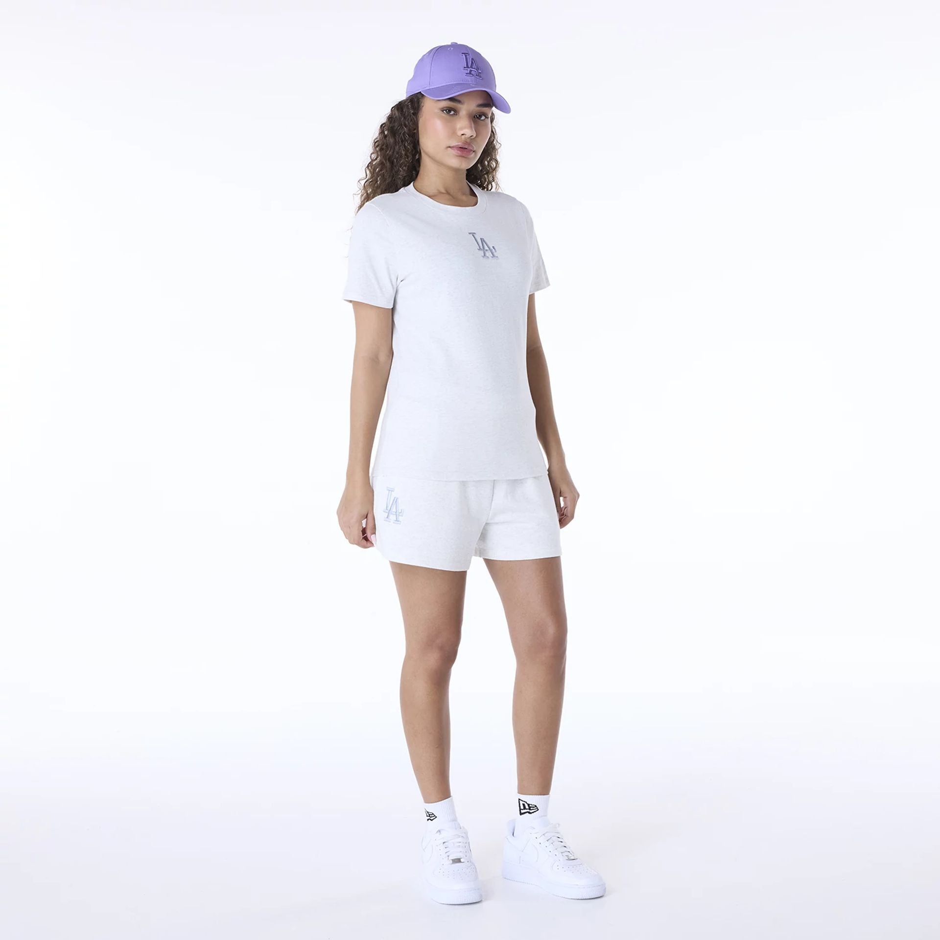 The Female model is wearing LA Dodgers Womens MLB League Essential Pastel Grey Shorts 5