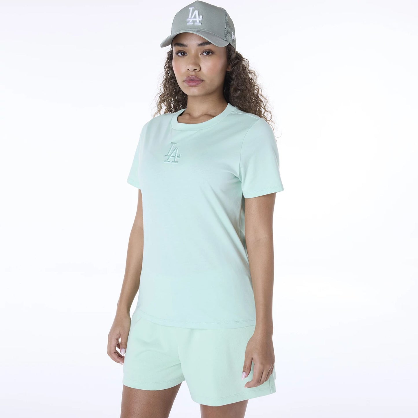 The Female model is wearing LA Dodgers Womens MLB League Essential Pastel Green T-Shirt 1