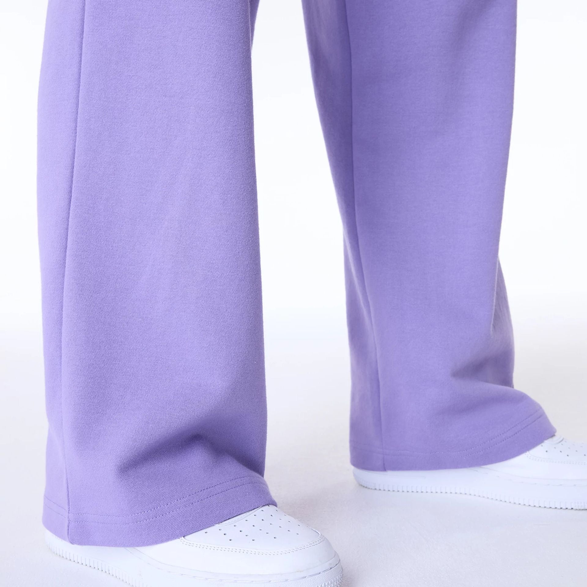 The Female model is wearing New York Yankees Womens MLB League Essential Purple Fleece Joggers 5