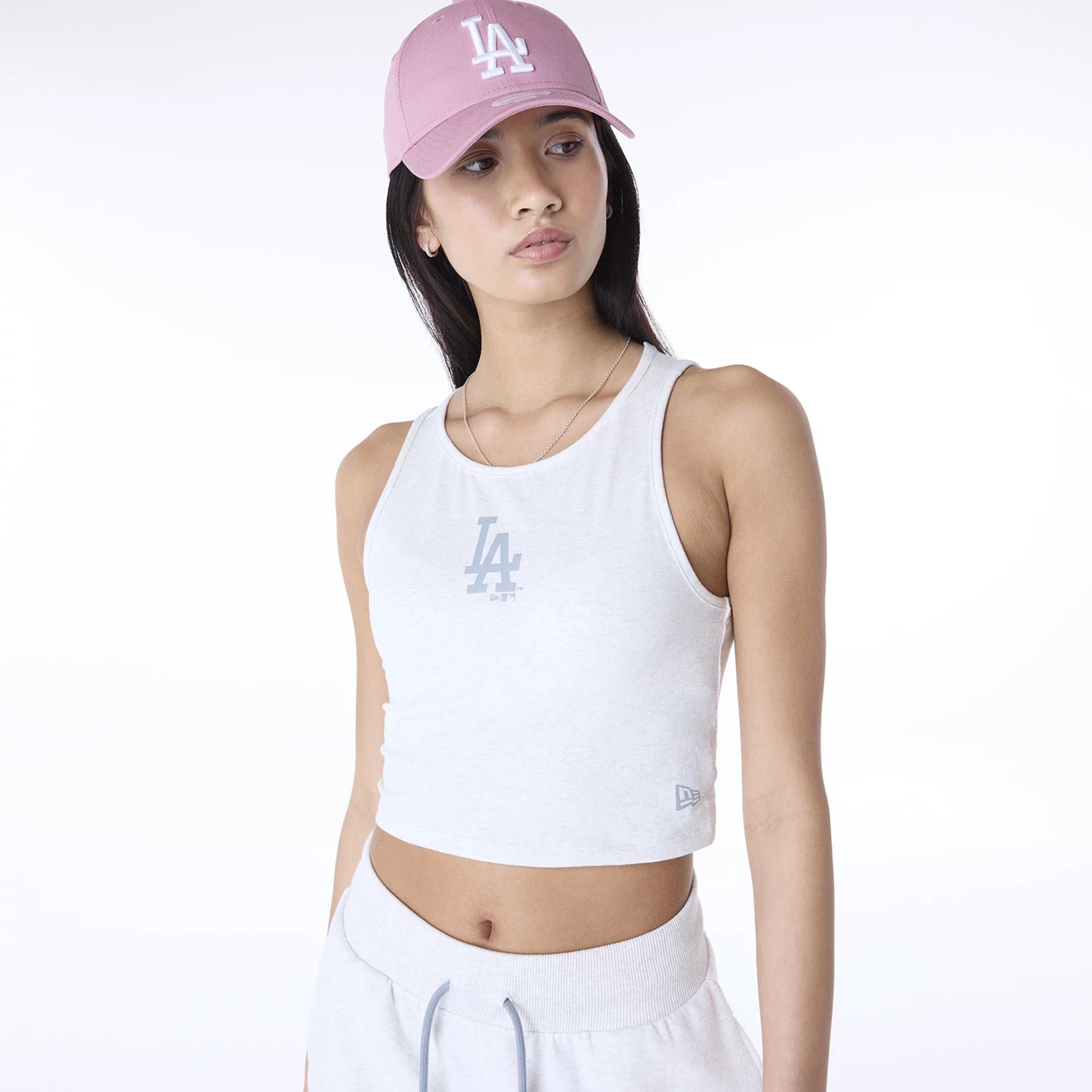 The Female model is wearing LA Dodgers Womens MLB League Essential Pastel Grey Vest 7