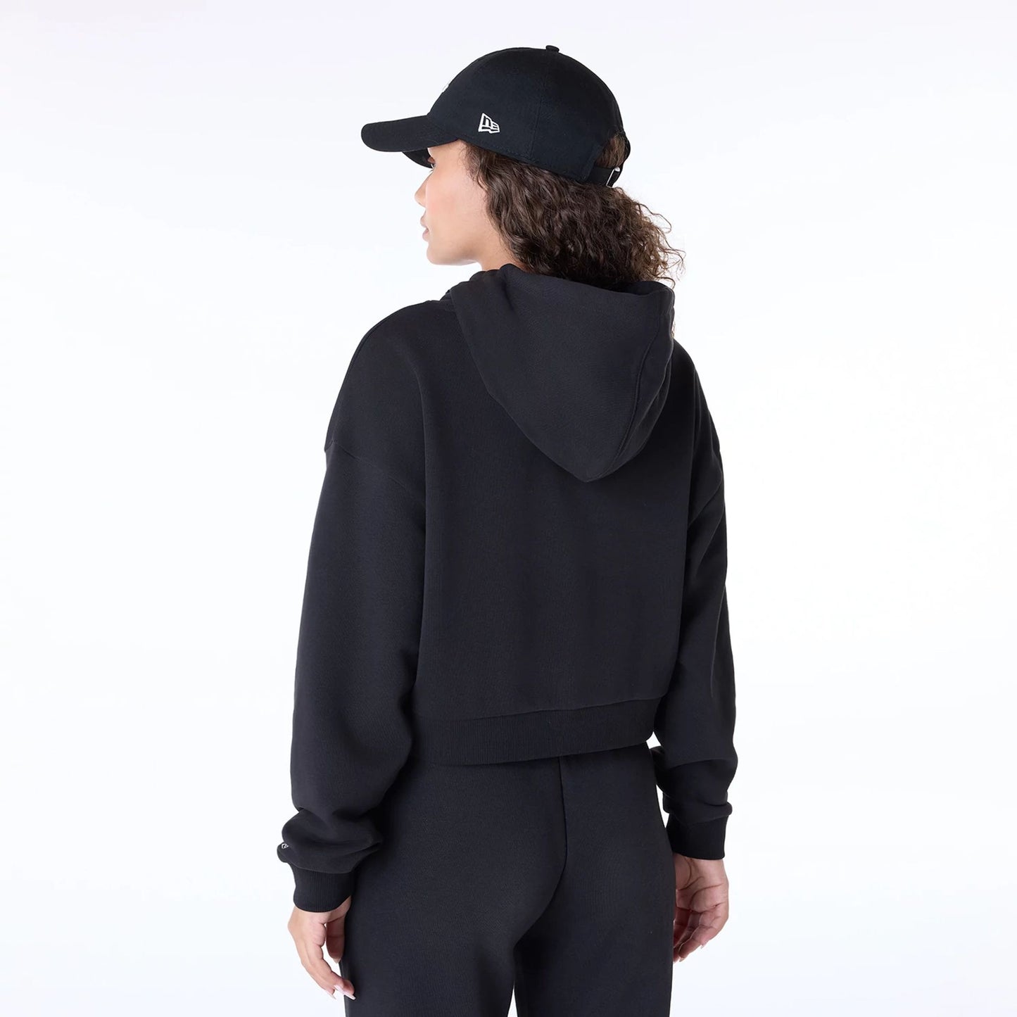 The Female model is wearing Womens New Era Script Black Pullover Hoodie 7