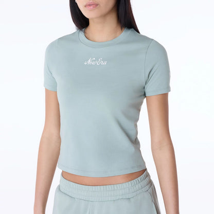 The Female model is wearing Womens New Era Slim Pastel Green T-Shirt 2