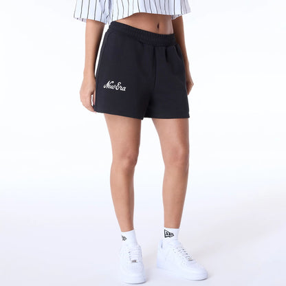 The Female model is wearing Womens New Era Script Black Shorts 1