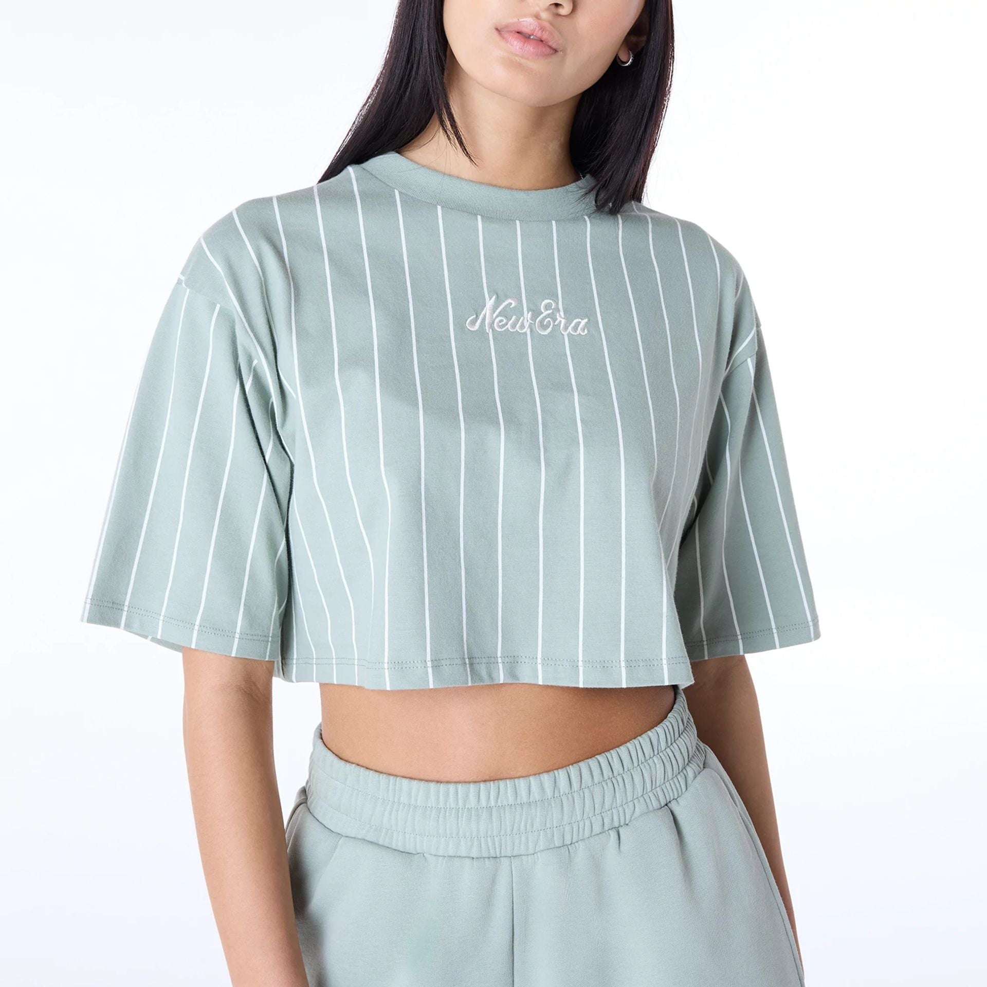 The Female model is wearing Womens New Era Pinstripe Pastel Green T-Shirt 2