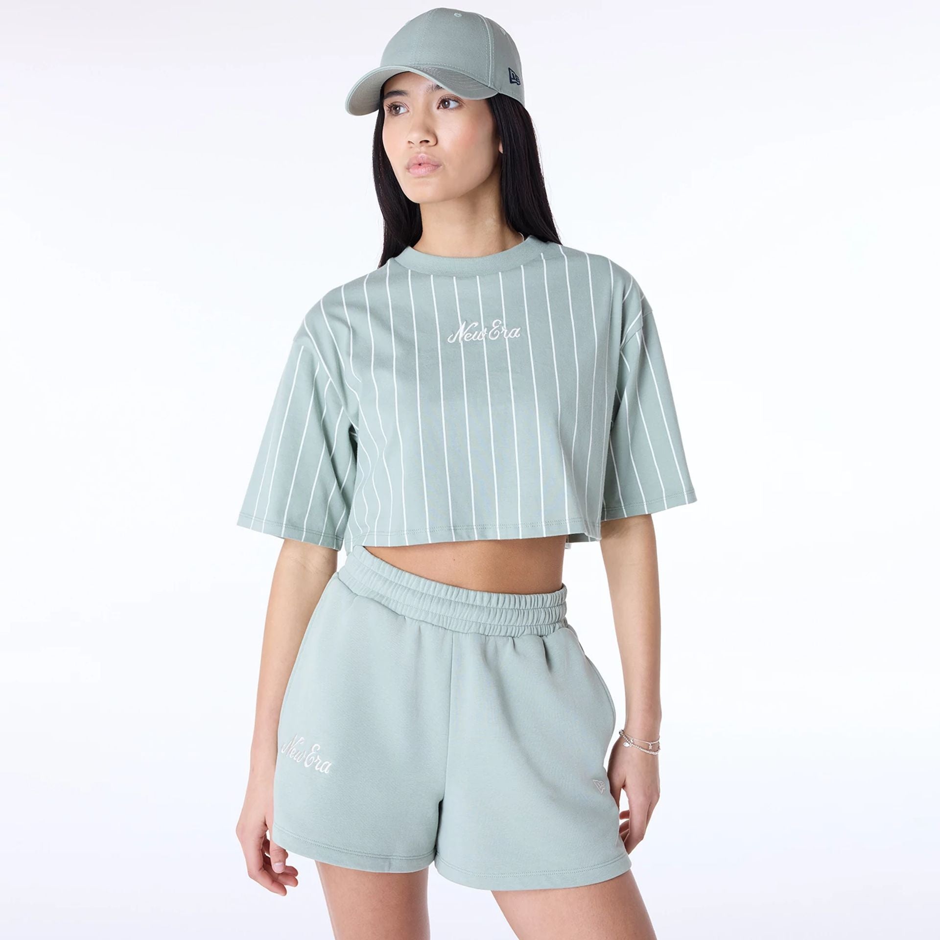 The Female model is wearing Womens New Era Pinstripe Pastel Green T-Shirt 1