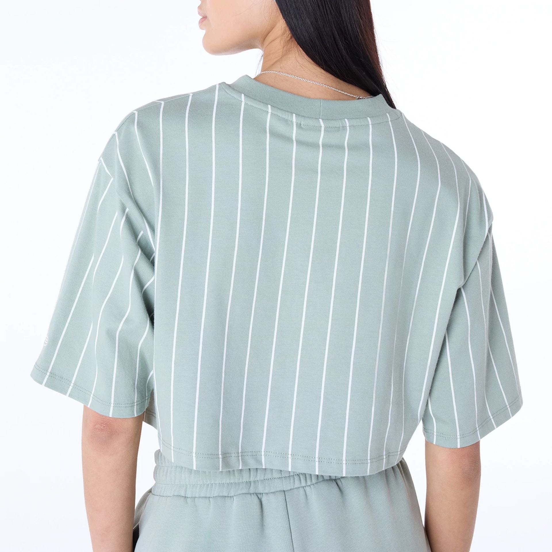 The Female model is wearing Womens New Era Pinstripe Pastel Green T-Shirt 6