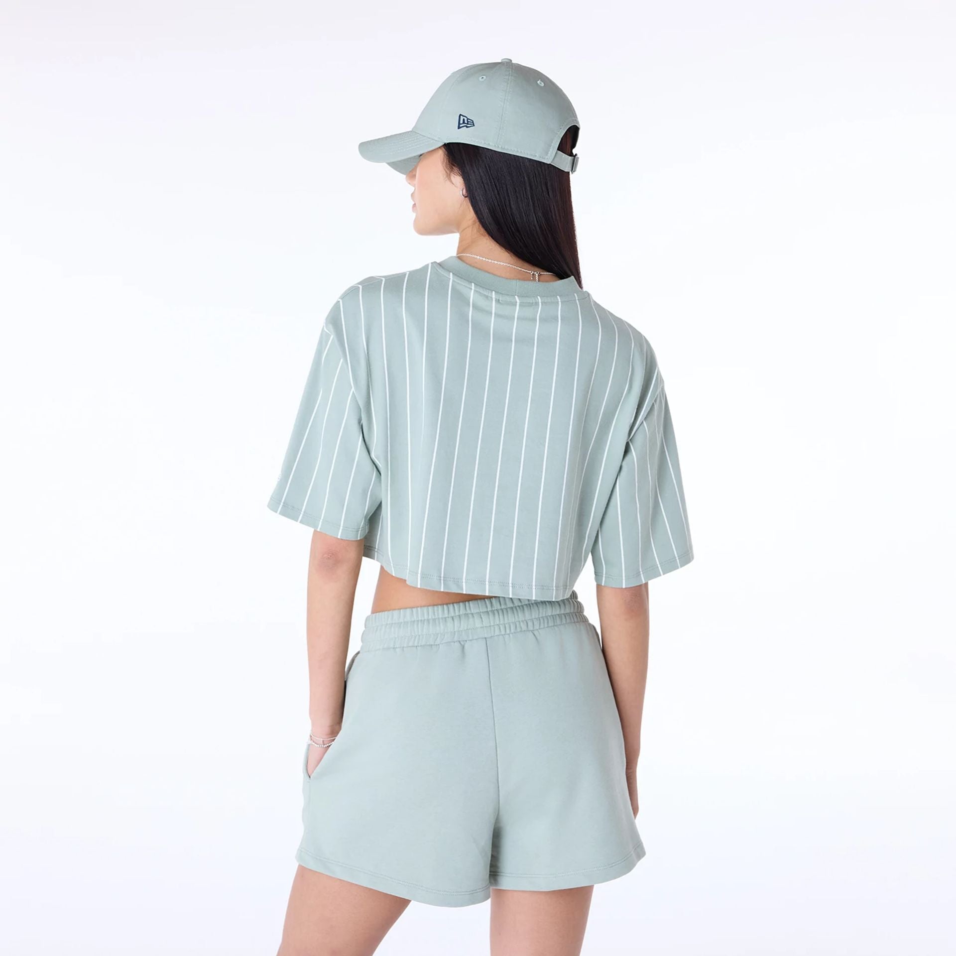 The Female model is wearing Womens New Era Pinstripe Pastel Green T-Shirt 7