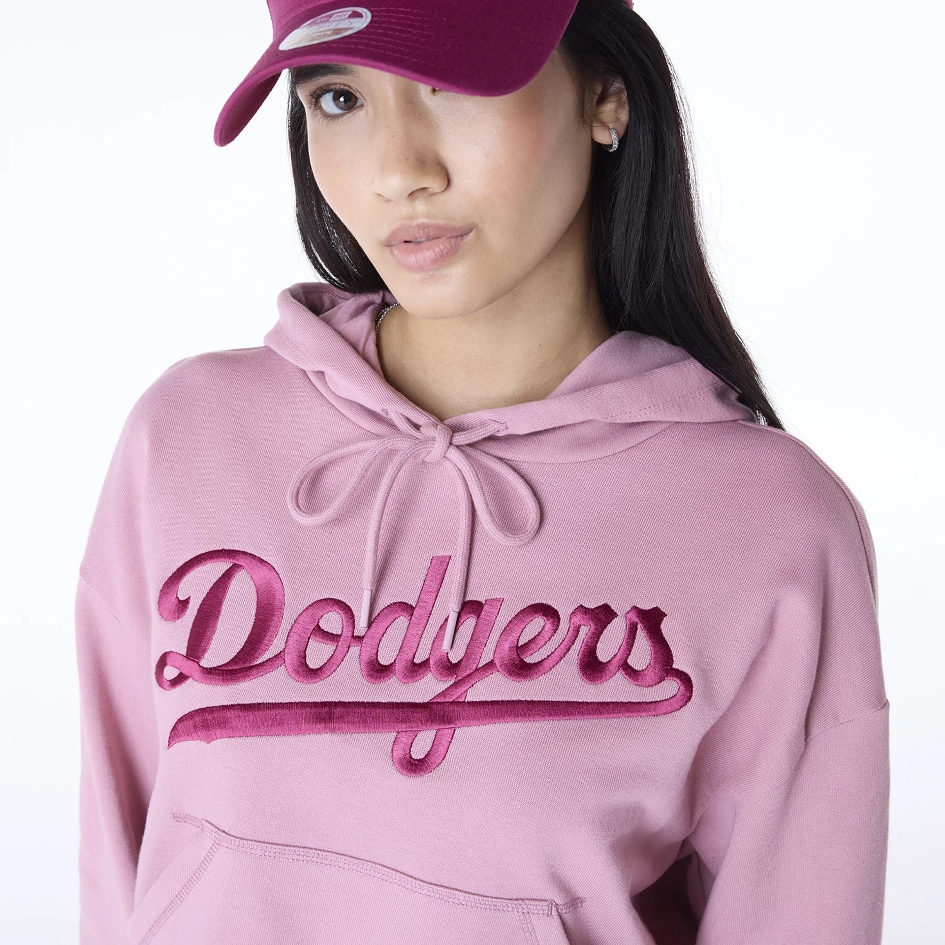 The Female model is wearing LA Dodgers Womens MLB Graphic Dark Pink Pullover Hoodie 6