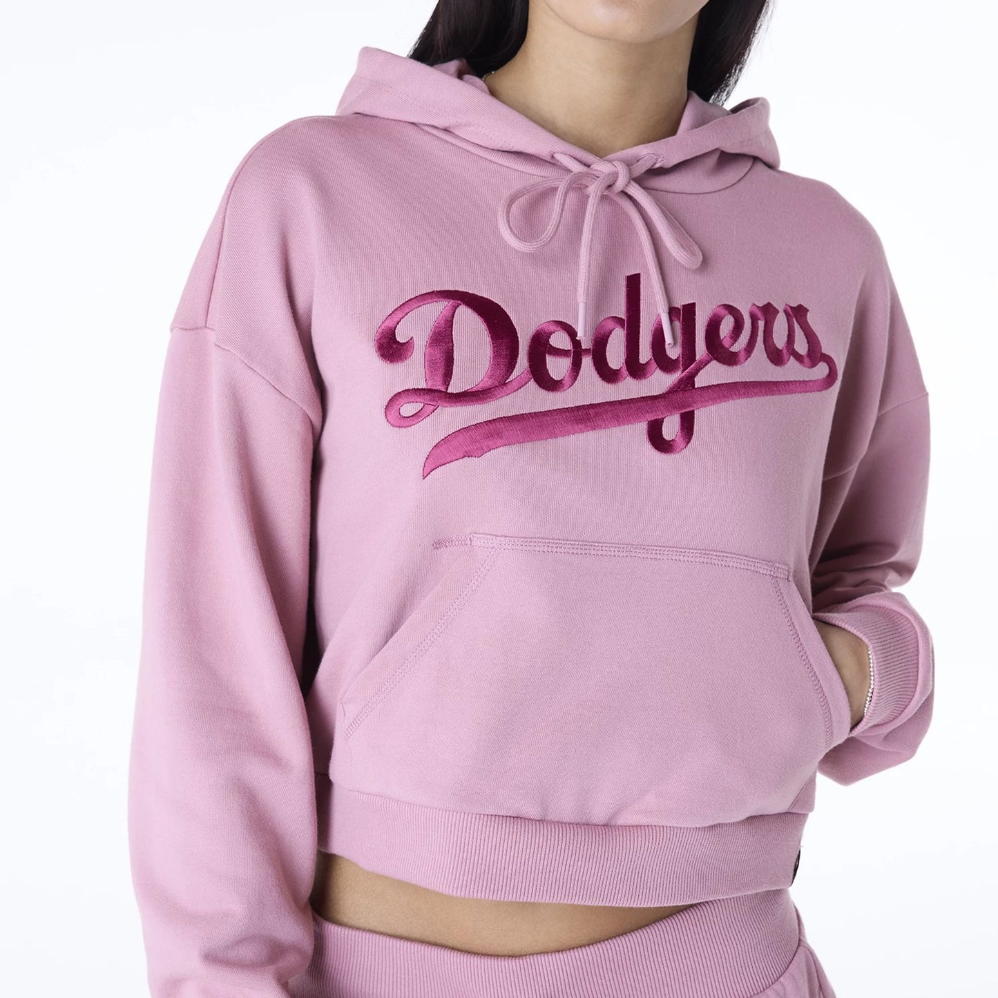 The Female model is wearing LA Dodgers Womens MLB Graphic Dark Pink Pullover Hoodie 4