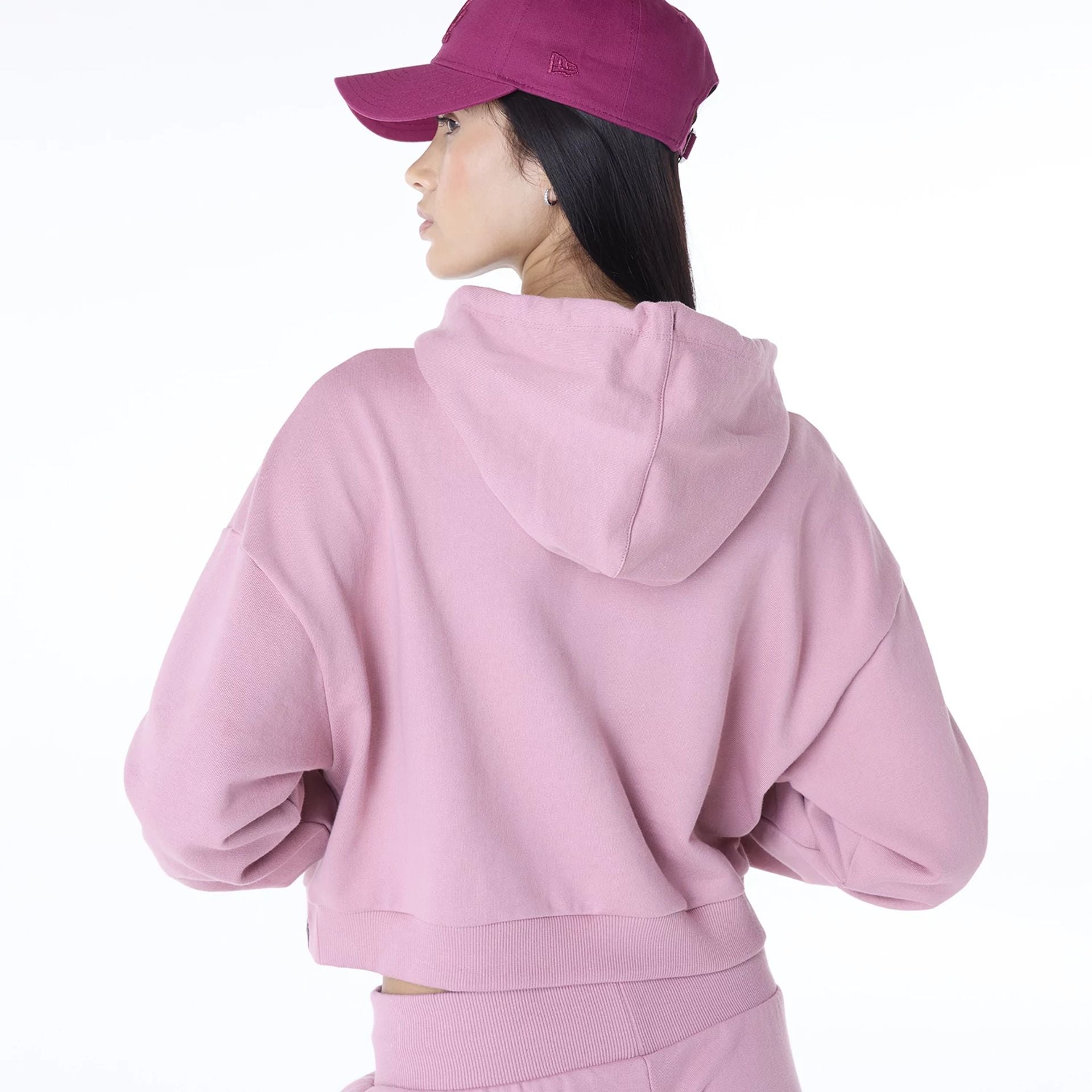 The Female model is wearing LA Dodgers Womens MLB Graphic Dark Pink Pullover Hoodie 5