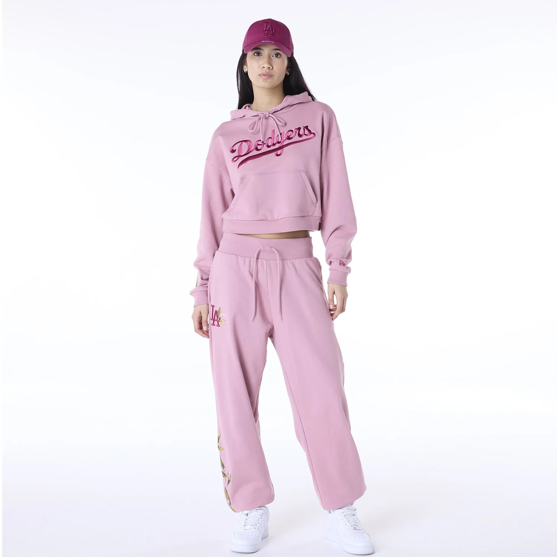 The Female model is wearing LA Dodgers Womens MLB Graphic Dark Pink Pullover Hoodie 3