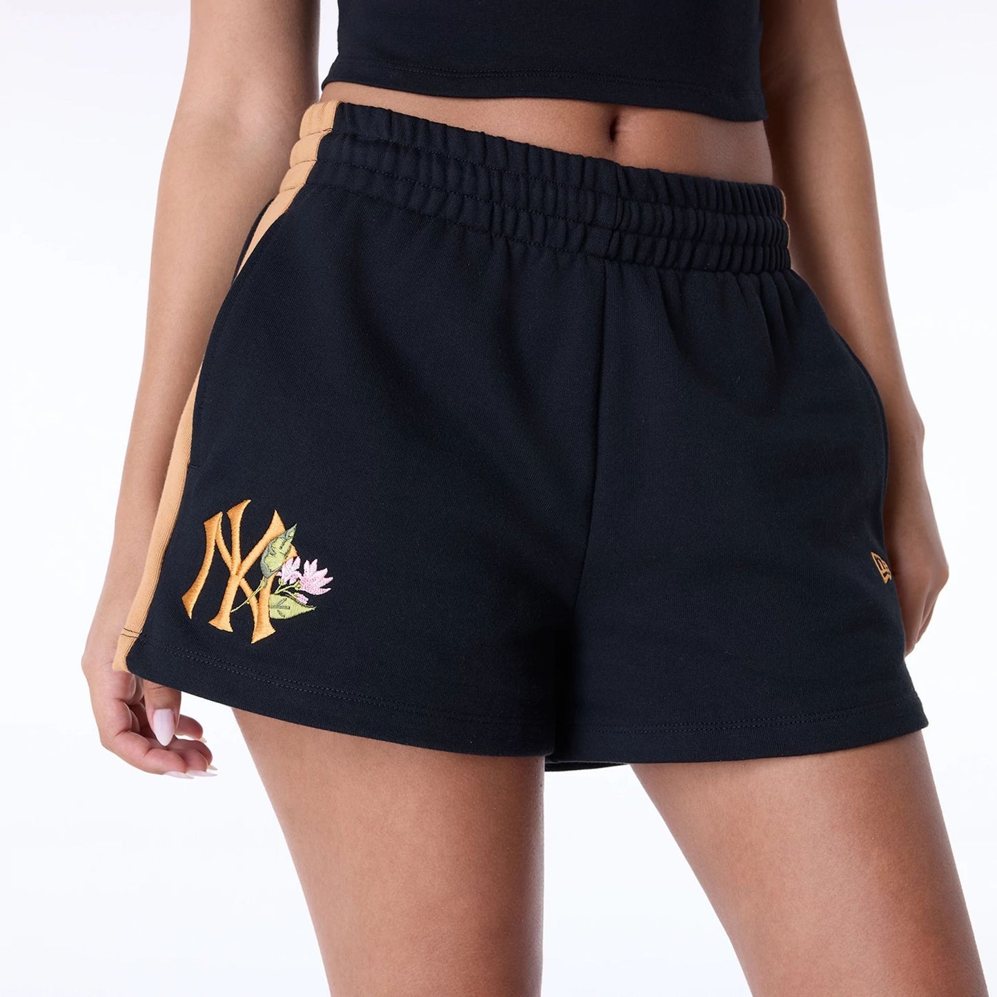 The Female model is wearing New York Yankees Womens MLB Floral Black Shorts 3