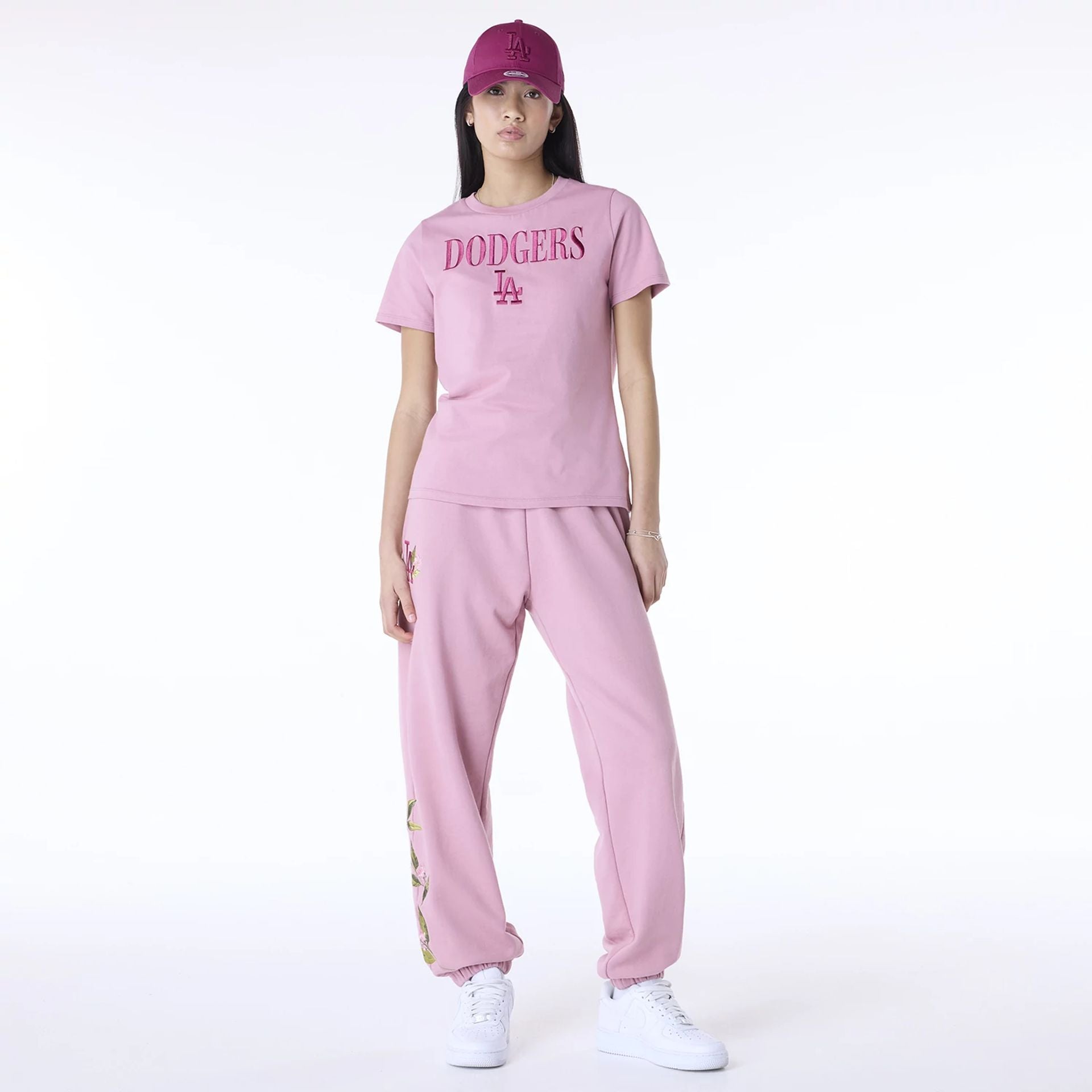 The Female model is wearing LA Dodgers Womens MLB Floral Dark Pink Joggers 3