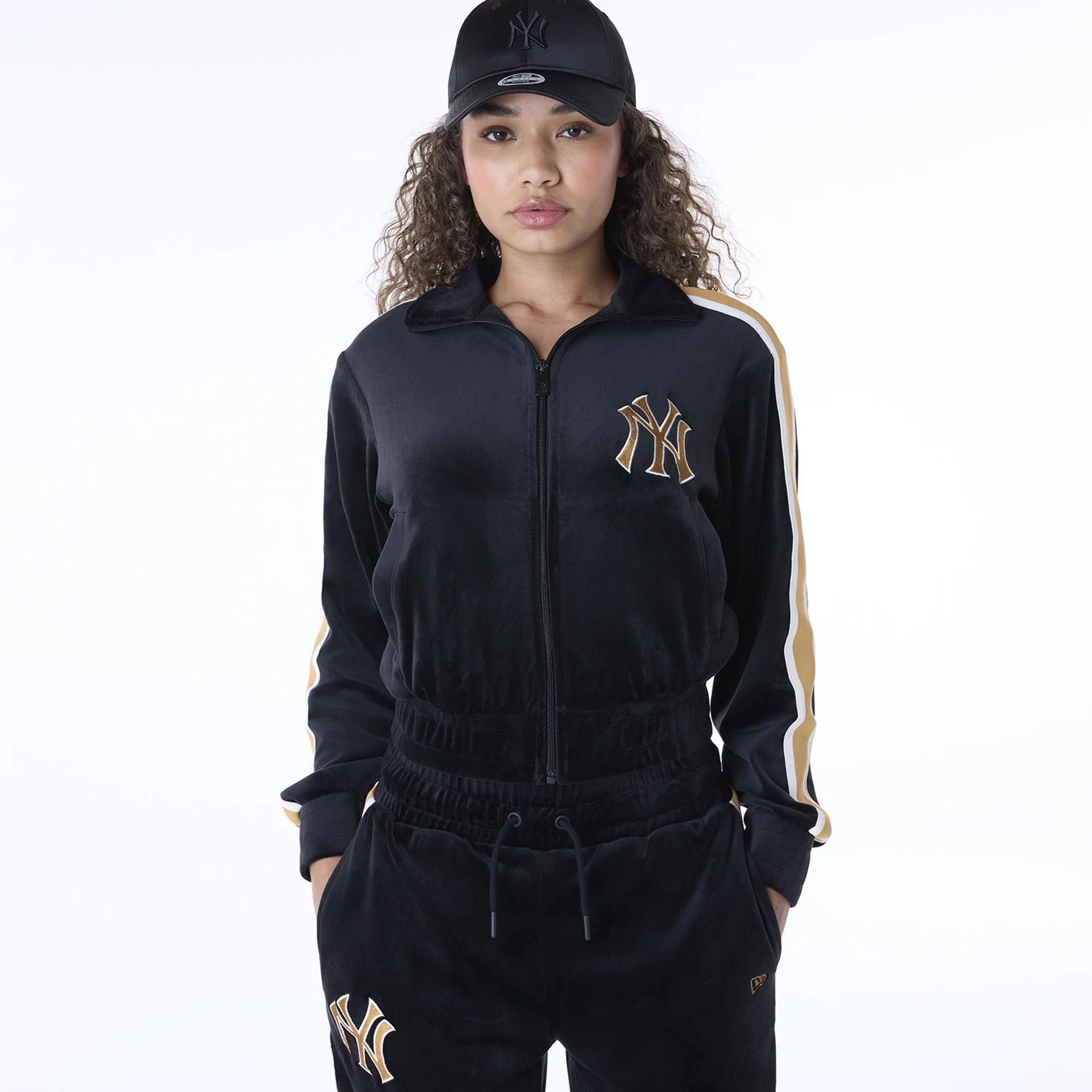 The Female model is wearing New York Yankees Womens MLB Velour Black Track Jacket 1